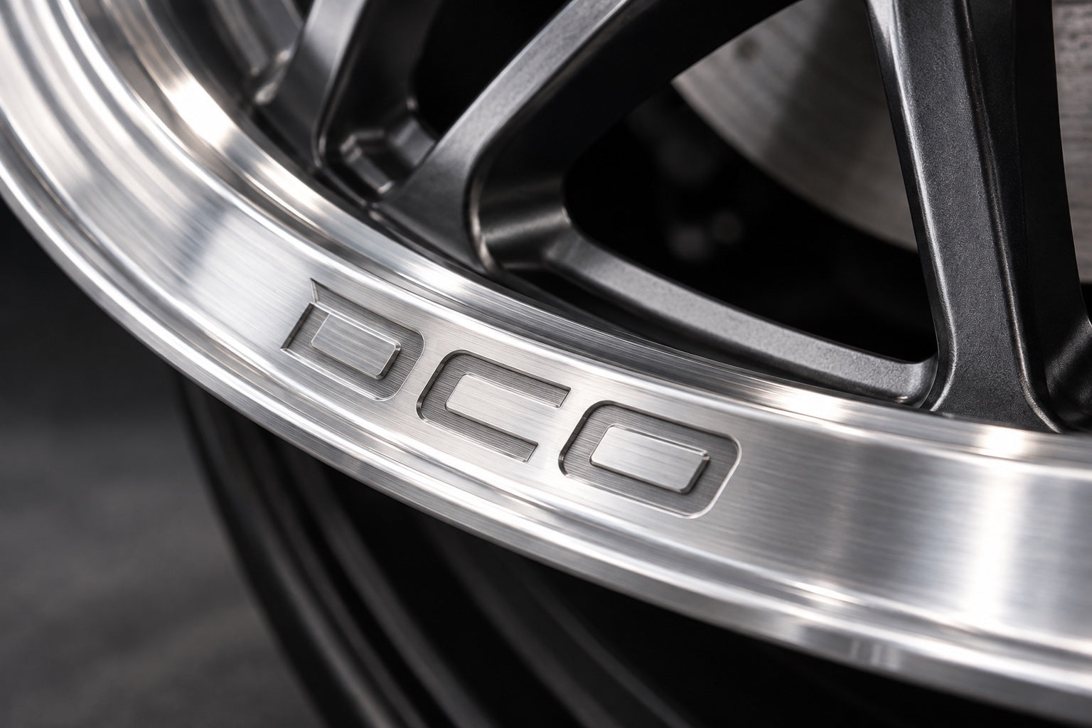 DCO engraved into a silver wheel lip